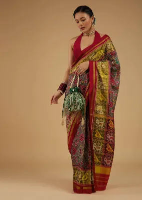 Citrus Green Saree In Silk With Ikat Weave Patola Work